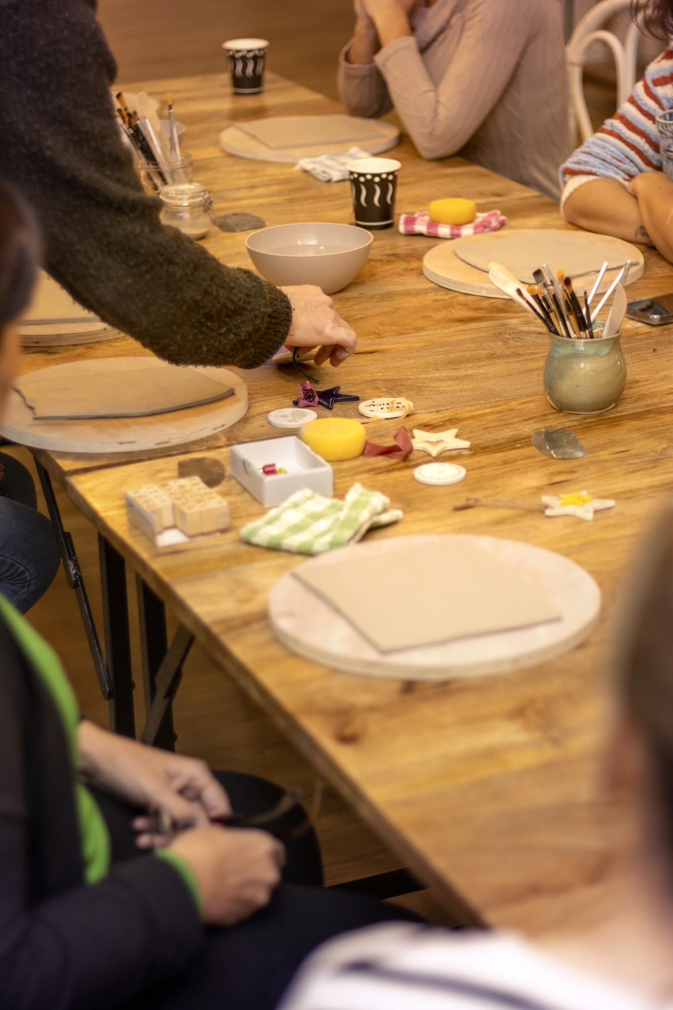 team tasting session around a wooden table